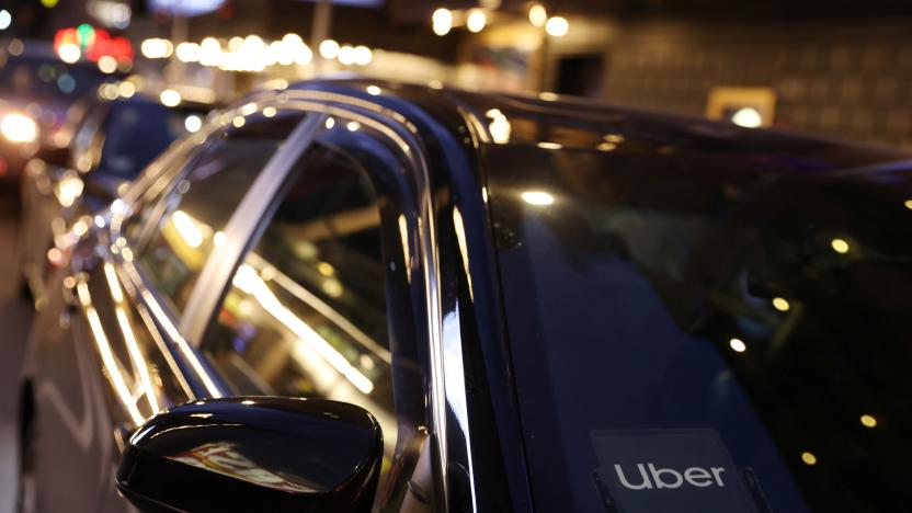 The logo for Uber Technologies is seen on a vehicle in Manhattan, New York City, New York, U.S., November 17, 2021. REUTERS/Andrew Kelly