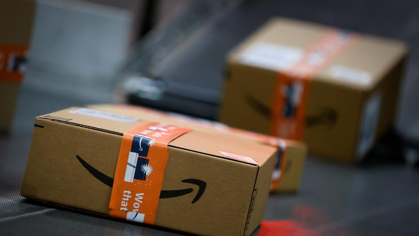 A fast-moving conveyor belt moves packages to delivery trucks during operations on Cyber Monday at Amazon's fulfillment center in Robbinsville, New Jersey, U.S., November 29, 2021. REUTERS/Mike Segar