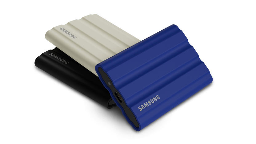 Samsung T7 Shield portable SSD in blue, black and beige.