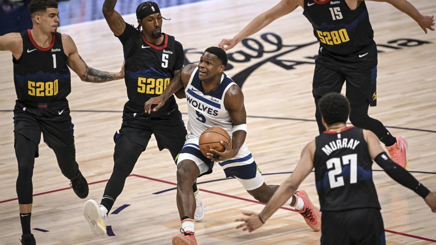 Getty Images - DENVER, CO - MAY 6: Anthony Edwards (5) of the Minnesota Timberwolves drives between Michael Porter Jr. (1), Kentavious Caldwell-Pope (5), Jamal Murray (27) and Nikola Jokic (15) of the Denver Nuggets during the first quarter at Ball Arena in Denver on Monday, May 6, 2024. (Photo by AAron Ontiveroz/The Denver Post)