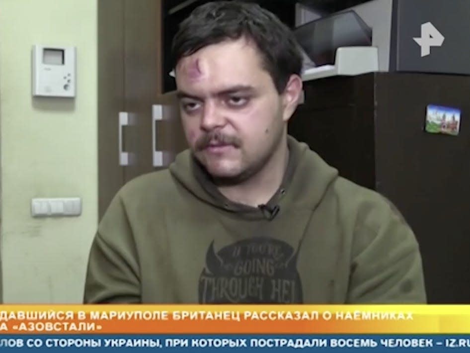 A British fighter captured in Ukraine by Russian forces appeared bloodied in an ..
