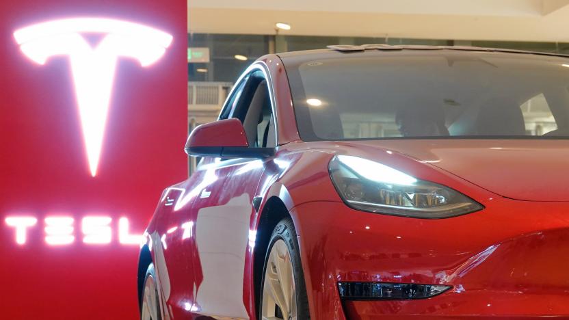 YANTAI, CHINA - OCTOBER 17, 2021 - A Tesla Model 3 is displayed at the Tesla Experience store in Joy City, Yantai, East China's Shandong Province, Oct 17, 2021. In September 2021, Tesla China set a new record of 56,006 vehicles. (Photo credit should read Tang Ke / Costfoto/Barcroft Media via Getty Images)