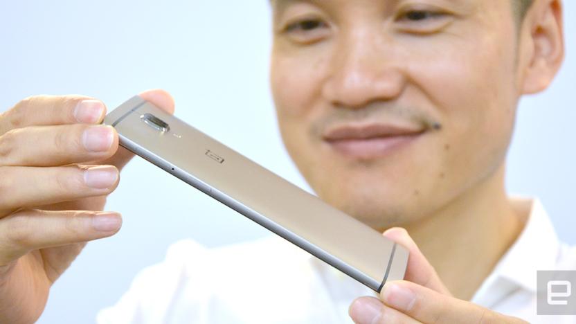 OnePlus CEO Pete Lau shows off his company's latest flagship phone, the OnePlus 3.