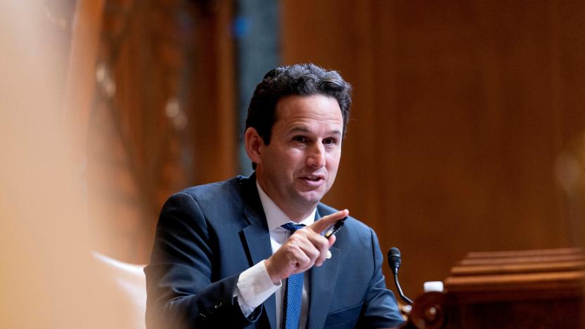 Sen. Brian Schatz, D-Hawaii, speaks as Commerce Secretary Gina Raimondo, testifies before a Senate Appropriations Subcommittee on Commerce, Justice, Science, and Related Agencies hearing on Capitol Hill in Washington, D.C., U.S., February 1, 2022. Andrew Harnik/Pool via REUTERS