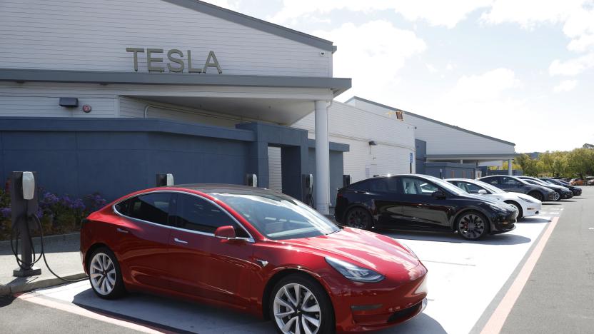 CORTE MADERA, CALIFORNIA - APRIL 26: Tesla cars charge at a Tesla Supercharger station on April 26, 2021 in Corte Madera, California. Tesla will report first quarter earnings today after the closing bell. (Photo by Justin Sullivan/Getty Images)