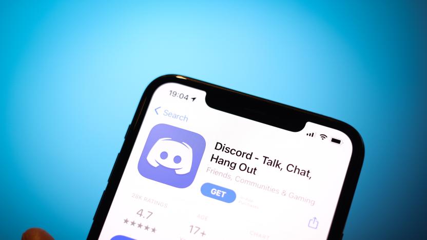 The Discord app is seen on an iPhone in this photo illustration in Warsaw, Poland on April 3, 2021. The communications and messaging platform Discord is reportedly in talks with Microsoft to sell it's platform. According to gaming tech website GamesBeat the sale could result in a USD 10 billion takeover. With over 9 million daily users Discord easily beats workplace messaging app Slack which attracted just over 2 million daily users at it's start. Microsoft could possibly integrate Discord with it's Xbox gaming platform as the app initially became popular with gamers. (Photo by Jaap Arriens/NurPhoto via Getty Images)