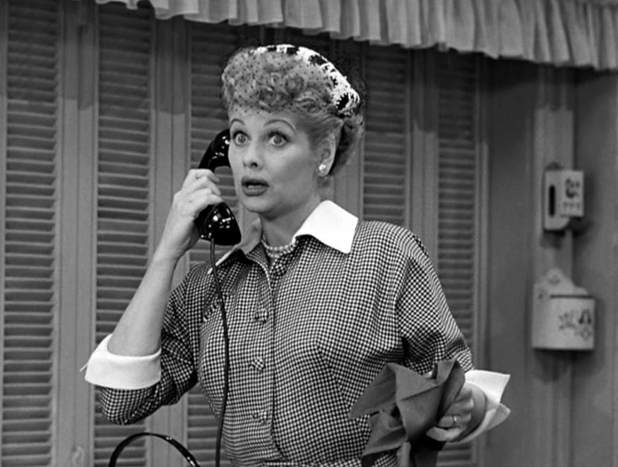 American actress and comedienne Lucille Ball (1911 - 1989) (left), as Lucy Ricardo, talks on the telephone in a scene from an episode of the television comedy 'I Love Lucy' entitled 'Job Switching,' Los Angeles, California, May 30, 1952. The episode was originally broadcast as the opening episode of the show's second season, on September 15, 1952. (Photo by CBS Photo Archive/Getty Images)
