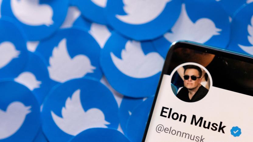 Elon Musk's Twitter profile is seen on a smartphone placed on printed Twitter logos in this picture illustration taken April 28, 2022. REUTERS/Dado Ruvic/Illustration