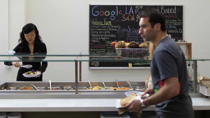 People eat in the cafeteria at the Google campus near Venice Beach, in Los Angeles, California January 13, 2012. The 100,000 square-foot campus was designed by architect Frank Gehry, and includes an entrance through an iconic pair of giant binoculars designed by Claes Oldenburg and Coosje van Bruggen. Around 500 employees develop video advertising for YouTube, parts of the Google+ social network and the Chrome Web browser at the site.   REUTERS/Lucy Nicholson (UNITED STATES - Tags: SCIENCE TECHNOLOGY BUSINESS SOCIETY)