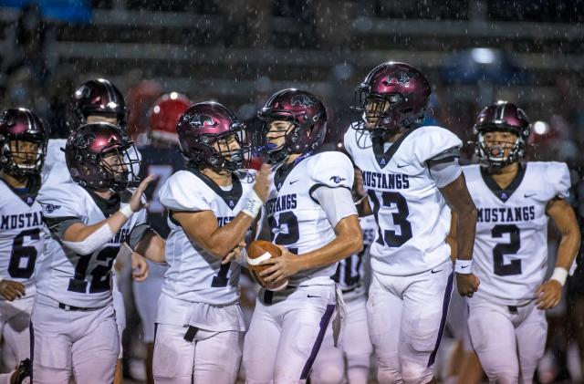 BRENTWOOD, TN - AUGUST 21:  Members of Lipscomb Academy celebrate during a football game against Brentwood Academy on August 21, 2020 in Brentwood, Tennessee. High school football restarted this week across most of Tennessee despite the coronavirus (COVID-19) pandemic still affecting many parts of the world.  