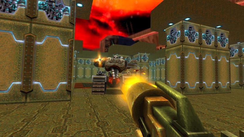 A gun is fired at a robotic enemy from a first-person perspective in Quake II