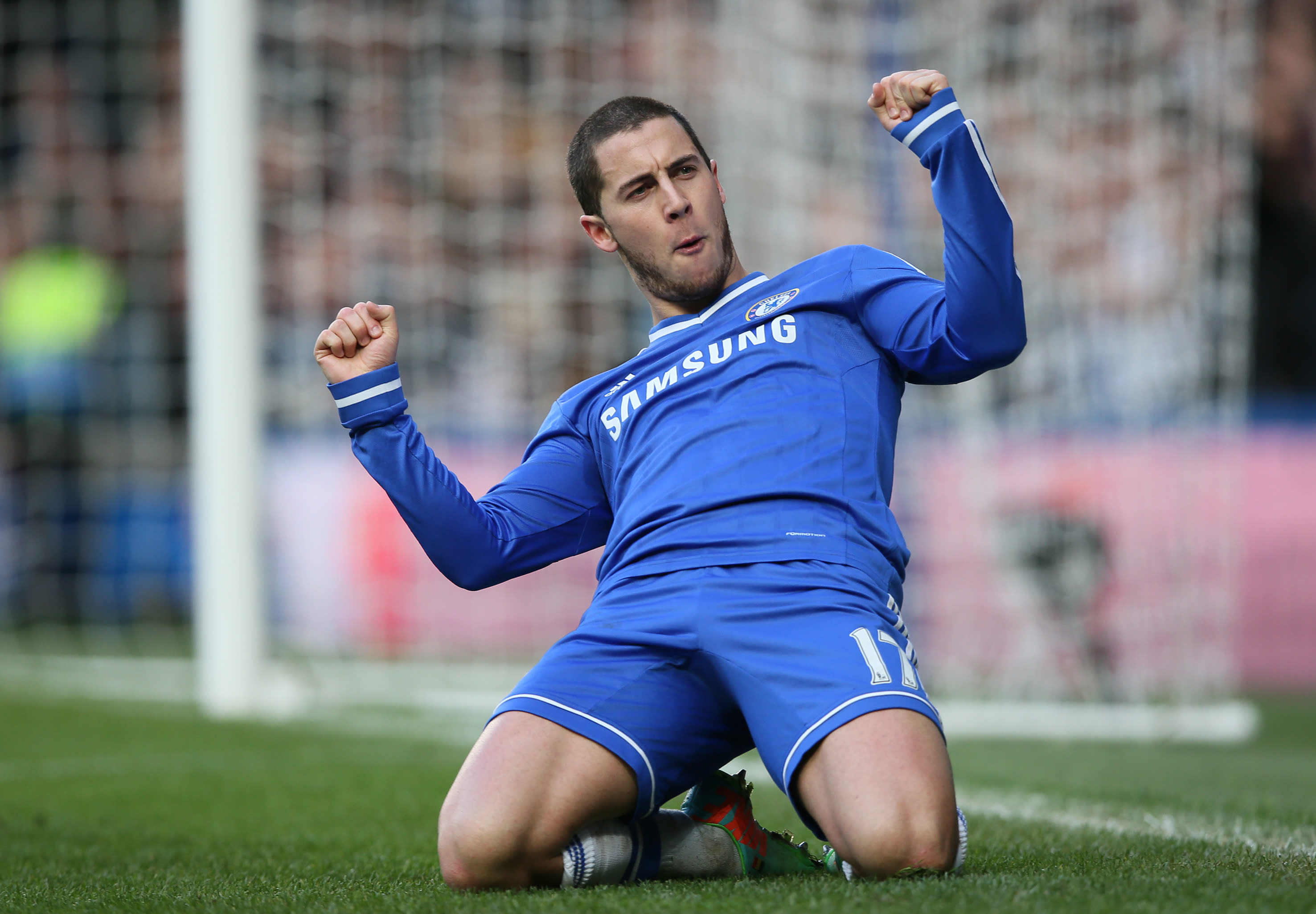  Eden Hazard celebrates scoring his first goal for Chelsea during his debut against Wigan Athletic on 18 August 2012.