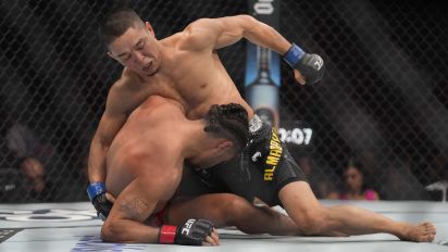 Associated Press - Asu Almabayev, top, strikes CJ Vergara during a UFC 299 mixed martial arts bout, Saturday, March 9, 2024, in Miami. (AP Photo/Wilfredo Lee)