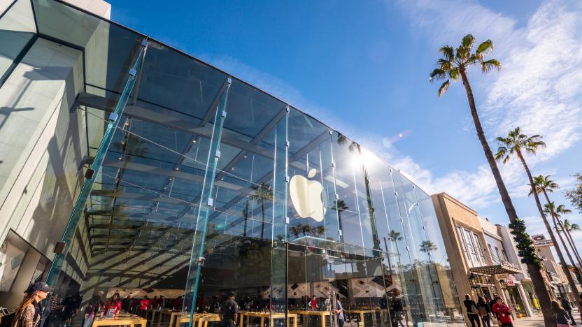 Santa Monica, USA - December 23, 2015: Apple Store on Third Street Promenade with people shopping inside and sightseeing outside on famous shopping street in Santa Monica downtown decorated for Xmas holidays.