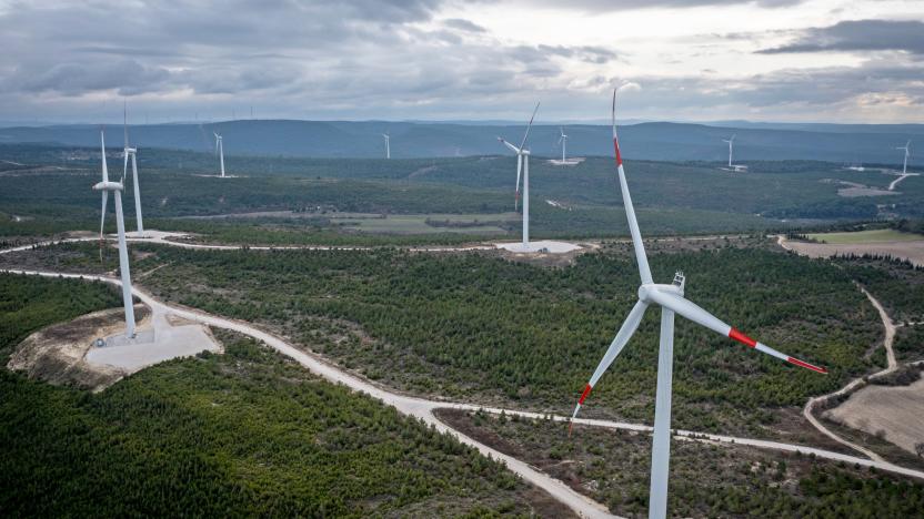 CANAKKALE, TURKEY – DECEMBER 17: Wind turbines are seen at the Akfen Renewable Energy Group’s, Canakkale Wind Power Plant,  on December 17, 2021 in Canakkale, Turkey. The Canakkale region of Turkey hosts more than 1000 operating wind turbines. In November, Turkey's installed wind power capacity reached 10,585 megawatts making it the second-largest renewable capacity after hydropower. In October, Turkey ratified the Paris Climate Agreement, becoming the last country in the G-20 group to do so and setting an aim for net-zero emissions by 2053 and a focus on new climate initiatives. However, gas and coal continue to be the primary fuel sources in the energy sector, forcing the government to shift towards renewables, such as geothermal, hydropower, wind and solar energy. Over recent years, Turkey has increased installed capacity of renewable sources of energy as it endeavors to cut its near total dependence on imported petroleum products. Oil and gas imports, much of which are used to generate electricity, have become a significant strain on foreign exchange reserves especially as the country deals with a dire economic crisis with the Turkish lira losing more than 40 percent of its value against the U.S dollar this year. However according to Turkey's Energy and Natural Resources Minister Fatih Donmez, Turkey’s power capacity in renewable energy reached approximately 53,000 megawatts at the end of October, and, on November 11, electricity production from wind power hit a historic daily record, generating 20.1 percent of total power. Turkey’s renewable energy capacity is predicted to grow by 50 percent from 2021 through 2026, according to a recent report by the International Energy Agency (IEA). (Photo by Chris McGrath/Getty Images)