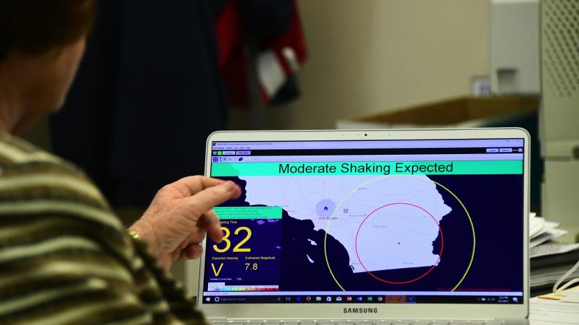 Margaret Vinci, manager of the Seismological Laboratory at California Institute of Technology (Caltech) points to a shake alert user display on a laptop screen, set for a limited release on June 1, 2017 at the Caltech Seismological Laboratory in Pasadena, California, where they addressed the elimination of federal funding for the West Coast Earthquake early Warning system, also known as ShakeAlert, in President Trump's FY2018 budget. / AFP PHOTO / FREDERIC J. BROWN        (Photo credit should read FREDERIC J. BROWN/AFP via Getty Images)