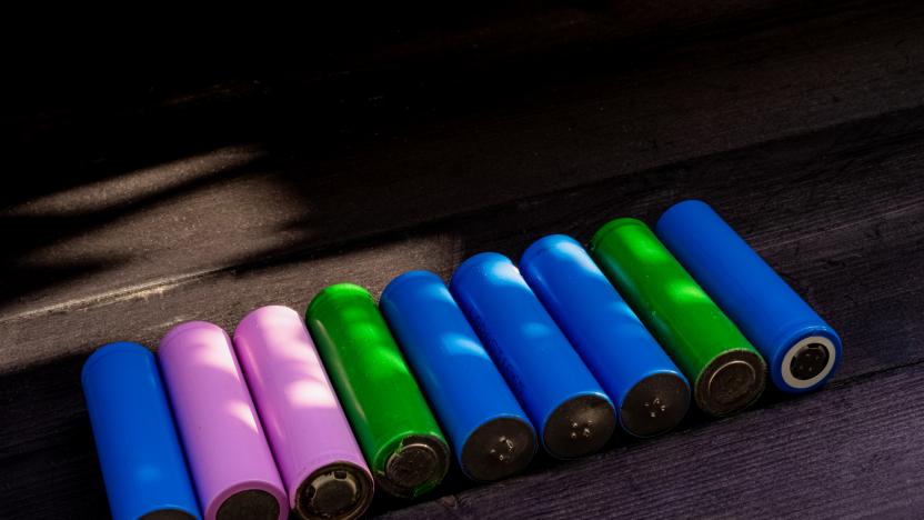 Batteries in '18650' format, on wooden background