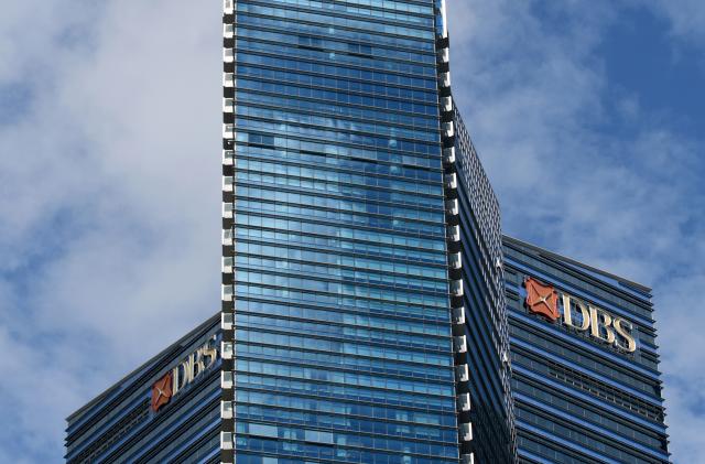 The DBS Bank logo is seen on a building in the Marina Bay Financial Centre in Singapore on June 19, 2020. (Photo by Roslan RAHMAN / AFP) (Photo by ROSLAN RAHMAN/AFP via Getty Images)