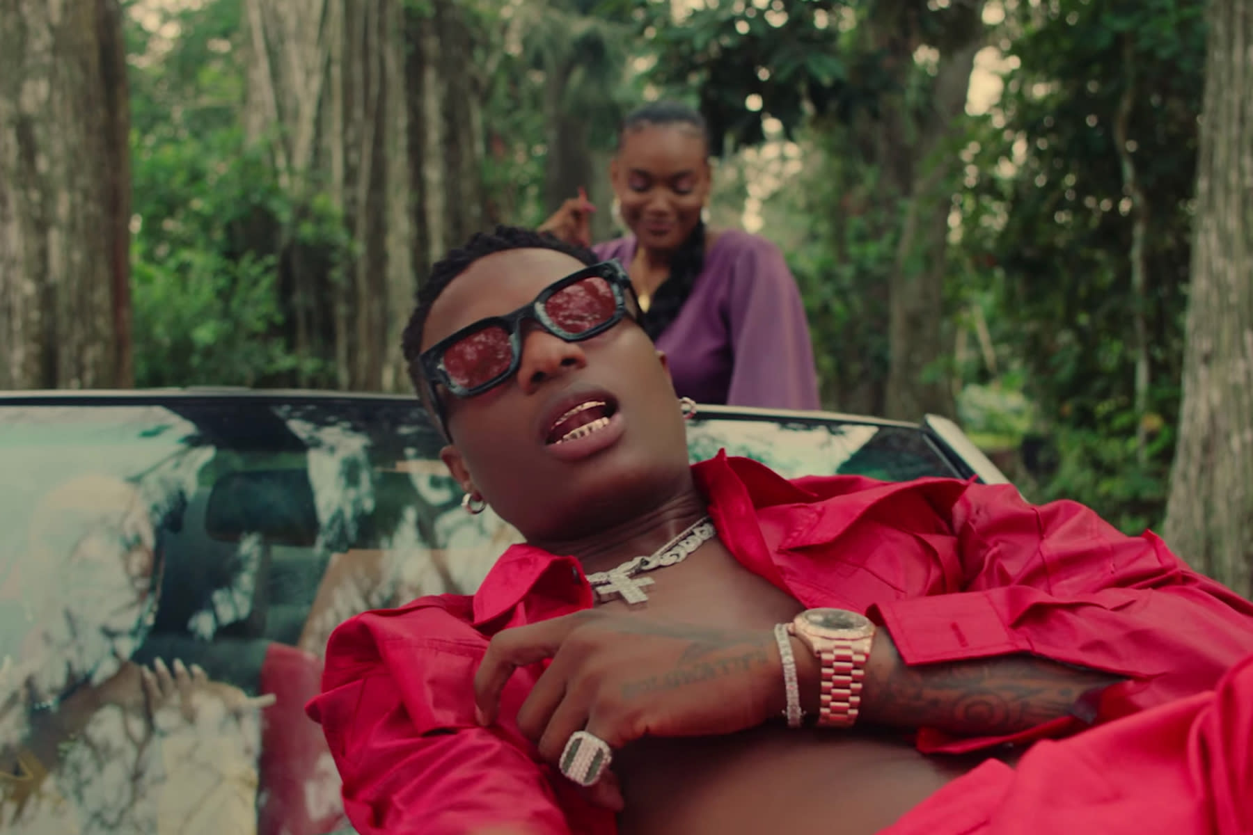 Wizkid and Tems Lounge and Glow in 'Essence' Video