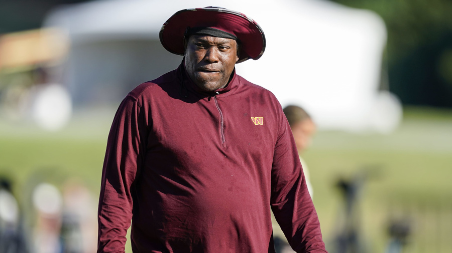 Associated Press - FILE - Former NFL player Warren Sapp walks on the field during practice at Washington Commander's NFL football training facility, Aug. 9, 2022, in Ashburn, Va. Hall of Fame defensive lineman Sapp is headed back to the classroom in order to work on the field with the Colorado Buffaloes. Buffaloes coach Deion Sanders added Sapp to the staff as a graduate assistant. (AP Photo/Alex Brandon, File)