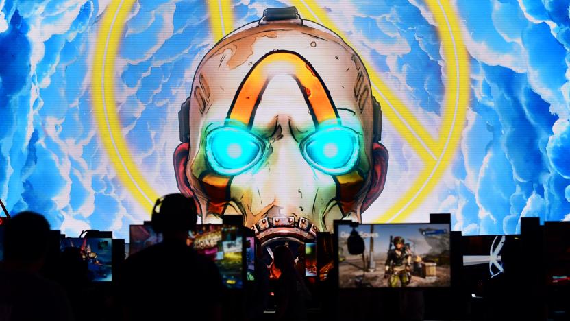 Gaming fans play "Borderlands 3" at the 2019 Electronic Entertainment Expo, also known as E3, in Los Angeles on June 11, 2019. - Gaming fans and developers gather, connecting thousands of the brightest, best and most innovative in the interactive entertainment industry and a chance for many to preview new games. (Photo by Frederic J. BROWN / AFP)        (Photo credit should read FREDERIC J. BROWN/AFP via Getty Images)