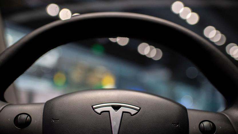 The inside of a Tesla car Model 3 is seen at a Tesla shop inside of a shopping Mall in Beijing on May 26, 2021. (Photo by NICOLAS ASFOURI / AFP) (Photo by NICOLAS ASFOURI/AFP via Getty Images)