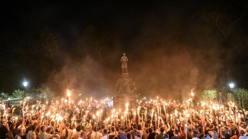 White nationalists participate in a torch-lit march on the grounds of the University of Virginia ahead of the Unite the Right Rally in Charlottesville, Virginia on August 11, 2017. Picture taken August 11, 2017.   REUTERS/Stephanie Keith