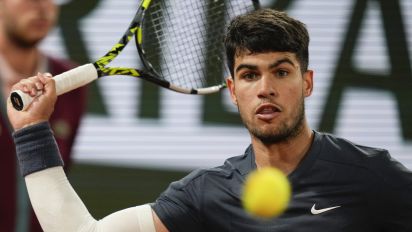 Associated Press - Spain's Carlos Alcaraz plays a shot against Sebastian Korda of the U.S. during their third round match of the French Open tennis tournament at the Roland Garros stadium in Paris, Friday, May 31, 2024. (AP Photo/Thibault Camus)