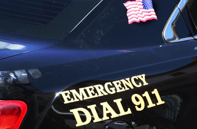 SANTA FE, NM - JULY 27, 2017:  A Santa Fe, New Mexico, police car is marked with 'Emergency Dial 911' painted on its side. (Photo by Robert Alexander/Getty Images)