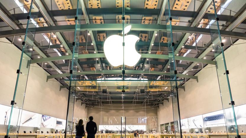 Santa Monica, United States - 21 March,  2015: two unidentified persons watching inside the Apple store on 3rd Street Promenade in Santa Monica near Los Angeles in California. The retail chain owned and operated by Apple Inc is dealing with computers and electronics worldwide, with 453 retail stores in 16 countries.