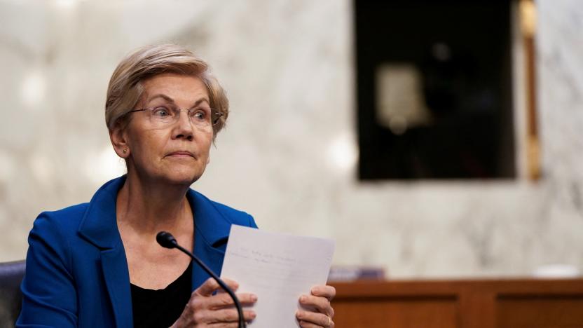 U.S. Senator Elizabeth Warren (D-MA) looks on as Federal Reserve Chair Jerome Powell testifies before a Senate Banking, Housing, and Urban Affairs Committee hearing on the "Semiannual Monetary Policy Report to the Congress", on Capitol Hill in Washington, D.C., U.S., June 22, 2022. REUTERS/Elizabeth Frantz