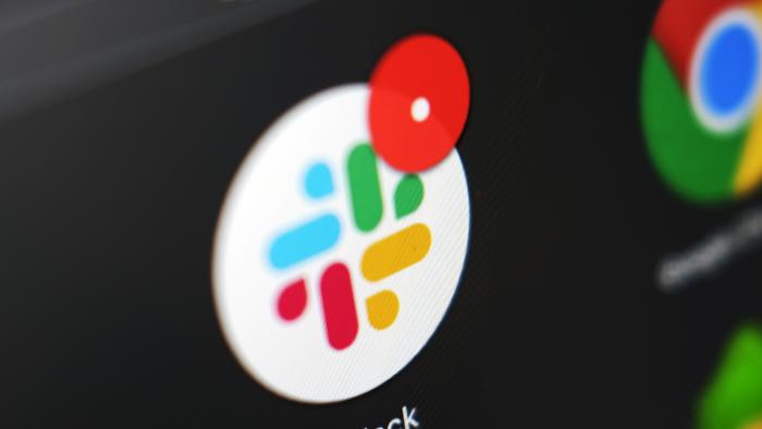 The Slack app icon is displayed on a computer screen, Wednesday, Dec 2, 2020, in Tokyo. In a deal announced Tuesday, Dec. 1, 2020, business software pioneer Salesforce.com is buying work-chatting service Slack for $27.7 billion in a deal aimed at giving the two companies a better shot at competing against longtime industry powerhouse Microsoft. (AP Photo/Kiichiro Sato)