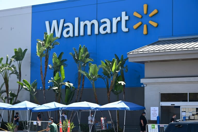 Walmart profits boosted by e-commerce, US stimulus payments