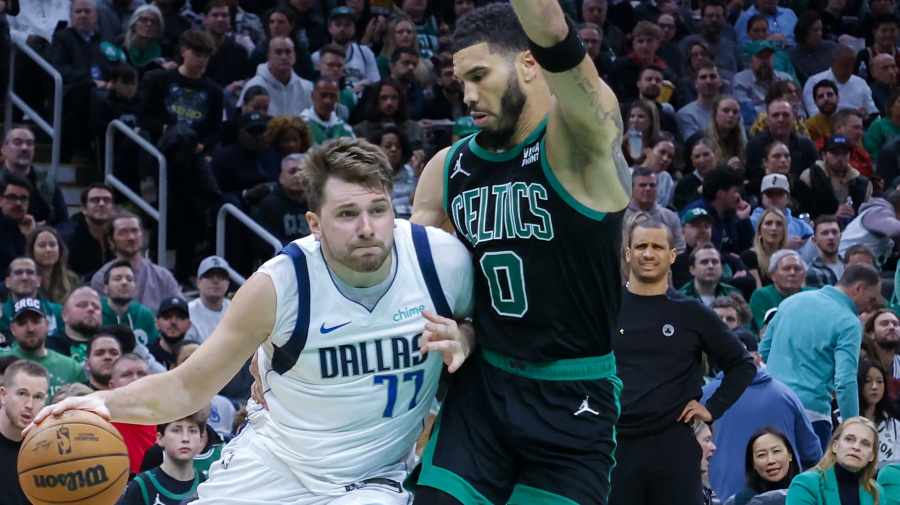 Getty Images - Boston, MA - March 1: Dallas Mavericks guard Luka Doncic drives to the basket on Boston Celtics forward Jayson Tatum in the third quarter. The Celtics beat the Dallas Mavericks, 138-110. (Photo by Matthew J. Lee/The Boston Globe via Getty Images)