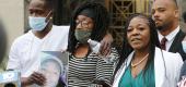 Myron Hammonds and Paula Bryant stand next to family attorney Michelle Martin. (AP)