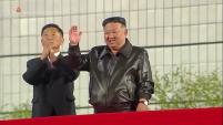 North Korean TV shows leader Kim Jong Un opening new apartment development project