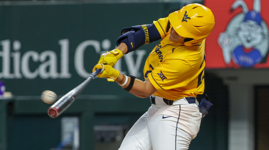 Getty Images - ARLINGTON, TX - MAY 22: West Virginia infielder J.J. Wetherholt (27) hits the ball during the 2024 Phillips 66 Big 12 Baseball Championship game between West Virginia and Kansas State on May 22, 2024, at Globe Life Field in Arlington, TX. (Photo by David Buono/Icon Sportswire via Getty Images)