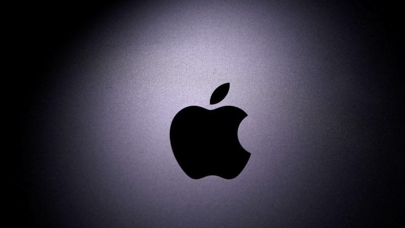 FILE PHOTO: Apple logo is seen on the MacBook in this illustration taken taken April 12, 2020. REUTERS/Dado Ruvic/Illustration/File Photo