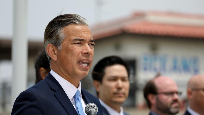 PLAYA DEL REY, CA - APRIL 28: California Attorney General Rob Bonta, flanked by his legal team, announced Thursday at Dockweiler State Beach that his office has launched an unprecedented investigation into the fossil fuel and petrochemical industries alleged role in causing and exacerbating the plastic pollution crisis on Thursday, April 28, 2022 in Playa Del Rey, CA. (Gary Coronado / Los Angeles Times via Getty Images)