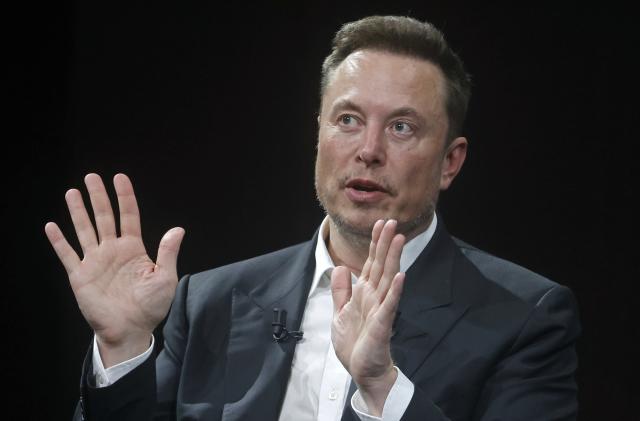 PARIS, FRANCE - JUNE 16: Chief Executive Officer of SpaceX and Tesla and owner of Twitter, Elon Musk gestures as he attends the Viva Technology conference dedicated to innovation and startups at the Porte de Versailles exhibition centre on June 16, 2023 in Paris, France. Elon Musk is visiting Paris for the VivaTech show where he gives a conference in front of 4,000 technology enthusiasts. He also took the opportunity to meet Bernard Arnaud, CEO of LVMH and the French President. Emmanuel Macron, who has already met Elon Musk twice in recent months, hopes to convince him to set up a Tesla battery factory in France, his pioneer company in electric cars. (Photo by Chesnot/Getty Images)