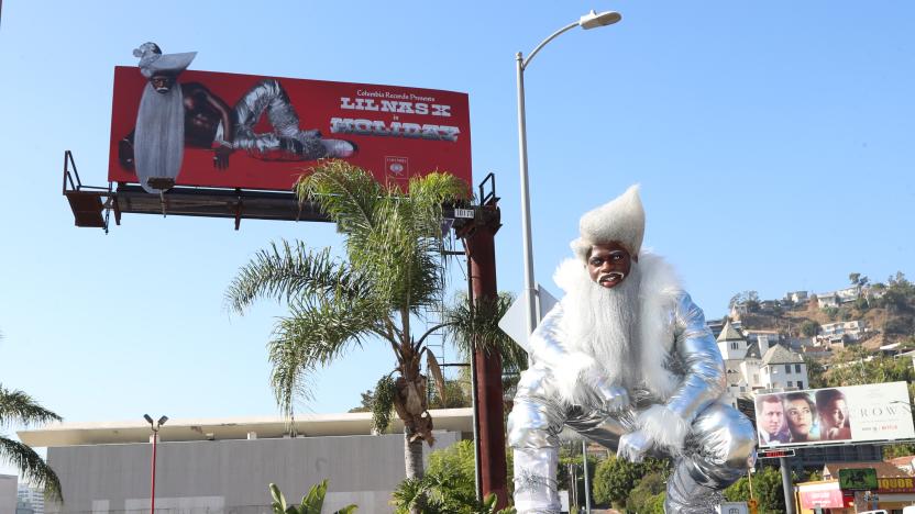 HOLLYWOOD, CALIFORNIA - NOVEMBER 19: Lil Nas X celebrates his new single "Holiday" with his billboard on Sunset Blvd on November 19, 2020 in West Hollywood, California. (Photo by Jerritt Clark/Getty Images for Columbia Records )