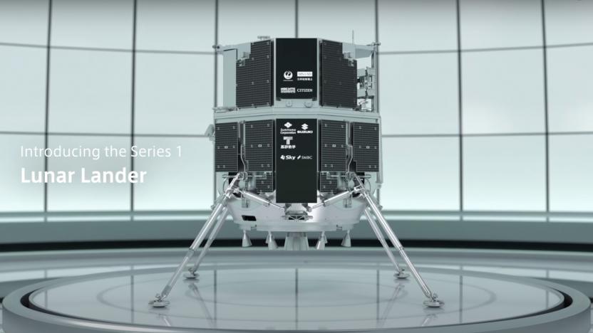 ispace's Hakuto-R lunar lander on a platform with a paneled wall in the background.