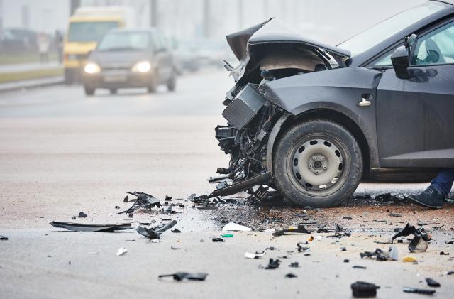 car crash accident on street, damaged automobiles after collision in city