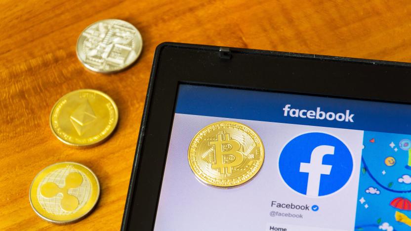 Prague, Czech Republic - June 18, 2019: Golden ripple, bitcoin and ethereum coins lying on homepage of Facebook launching digital wallet Calibra and cryptocurrency Libra on June 18, 2019 in Prague, Czech Republic.