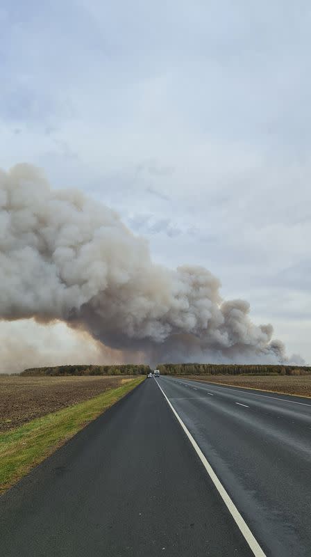 Smoke rises from the site of a fire at an ammunition depot in Ryazan Region