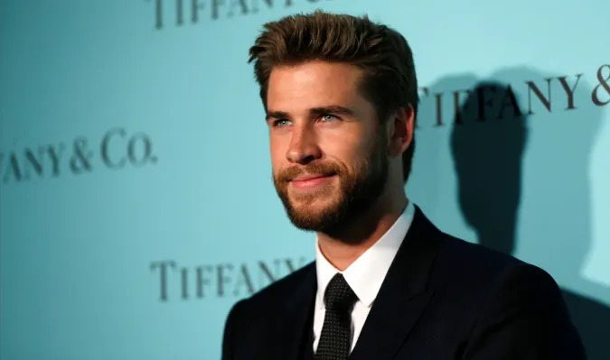 Actor Liam Hemsworth poses at a reception for the re-opening of the Tiffany & Co. store in Beverly Hills, California U.S., October 13, 2016. REUTERS/Mario Anzuoni