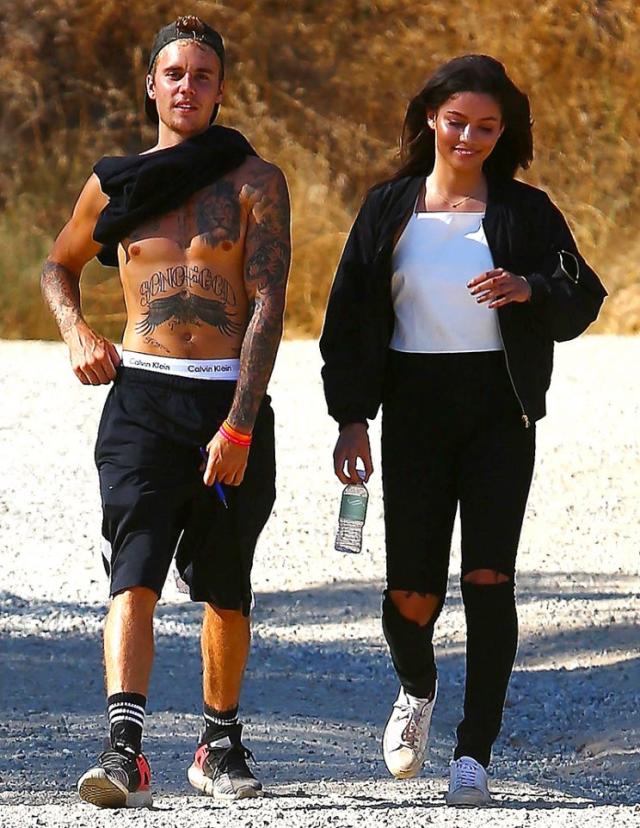 Justin Bieber hikes with new flame.
