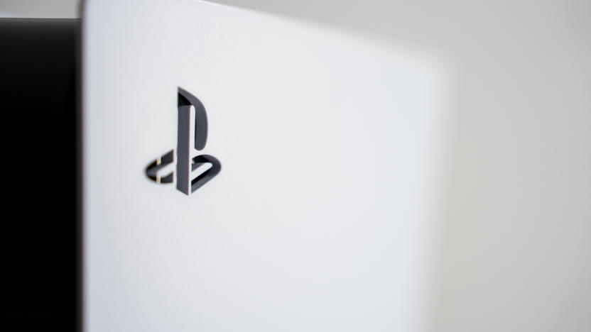 The PlayStation 5 logo on the surface of a PS5 console. (Photo by Nikos Pekiaridis/NurPhoto via Getty Images)