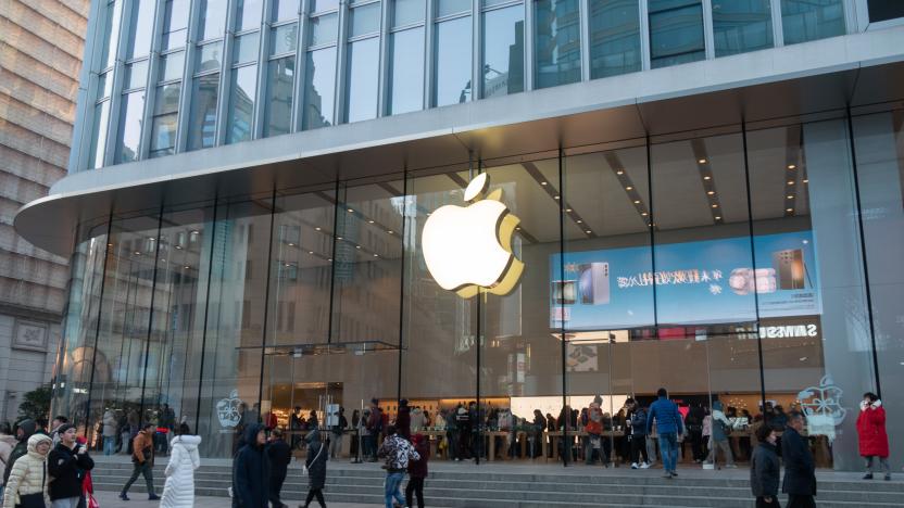 SHANGHAI, CHINA - DECEMBER 22, 2023 - Citizens walk past an Apple store in Shanghai, China, December 22, 2023. (Photo credit should read CFOTO/Future Publishing via Getty Images)