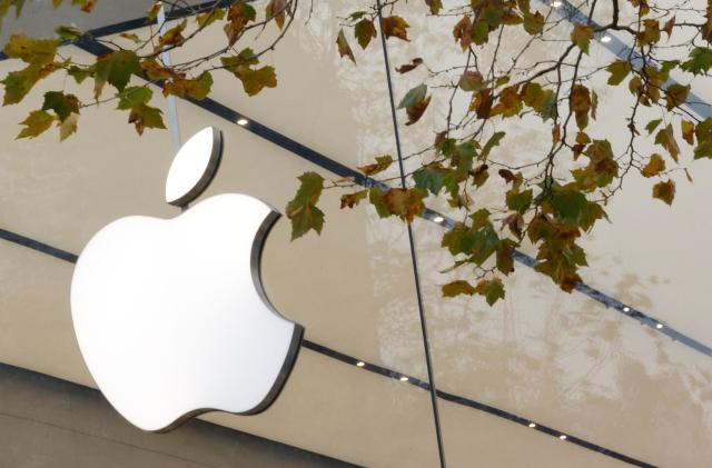 The Apple Inc logo is seen at the entrance to the Apple store in Brussels, Belgium November 28, 2022. REUTERS/Yves Herman